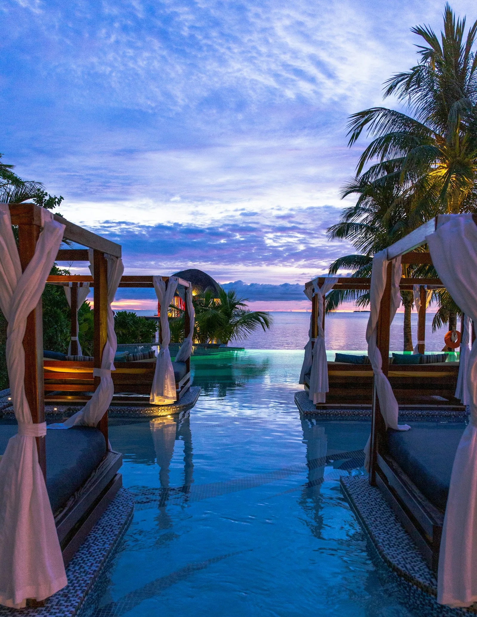 Modern pool villa at dusk on the quiet Hua Hin coast